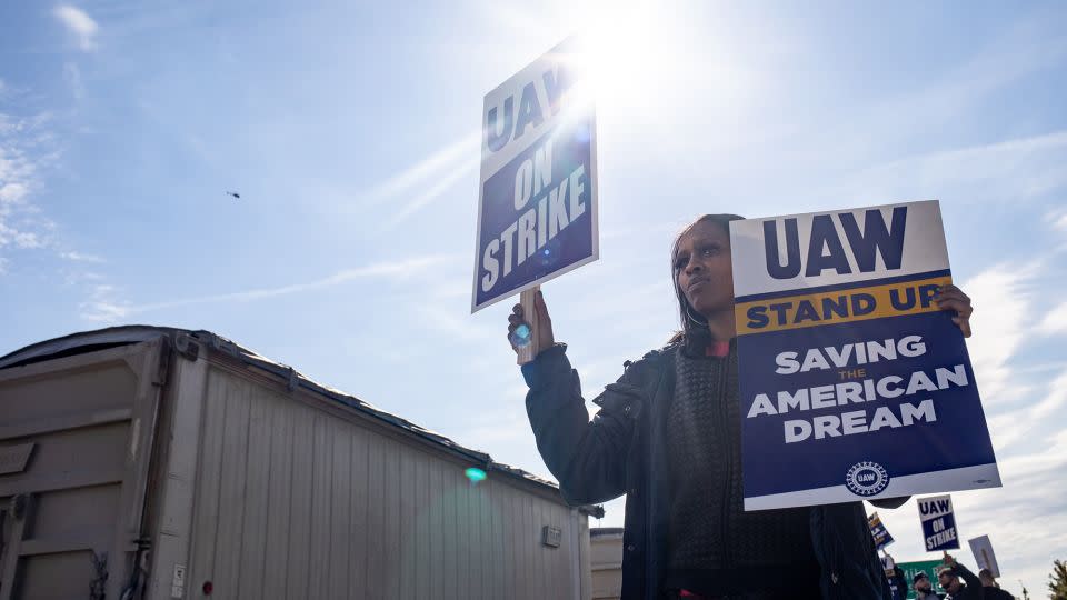 A UAW On Strike sign held on a picket line outside the Stellantis Assembly Plant in Sterling Heights, Michigan, shortly before the end of the strike. - Emily Elconin/Bloomberg/Getty Images