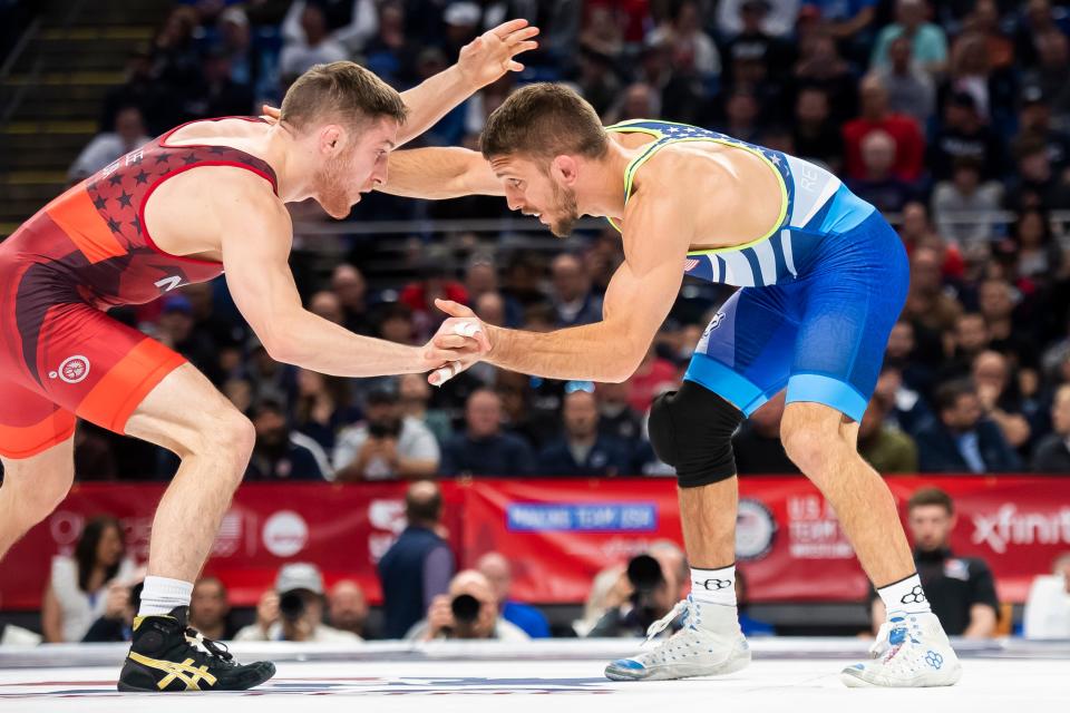 Zain Retherford (right) wrestles Nick Lee in the 65 kilogram best-of-three championship series during the U.S. Olympic Team Trials at the Bryce Jordan Center April 19, 2024, in State College. Retherford won the first bout, 2-1.