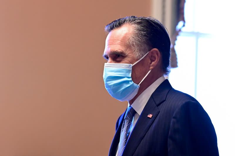 U.S. Sen. Romney walks through the U.S. Capitol in Washington