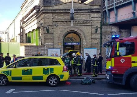 Emergency services attend the scene following a blast on an underground train at Parsons Green tube station in West London, Britain September 15, 2017, in this image taken from social media. TWITTER / @ASolopovas/via REUTERS
