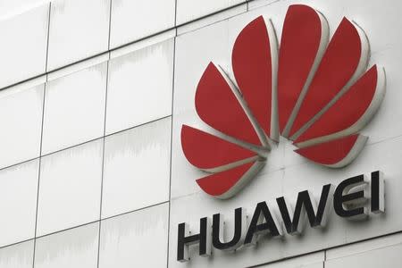 The logo of the Huawei Technologies Co. Ltd. is seen outside its headquarters in Shenzhen, Guangdong province, April 17, 2012. REUTERS/Tyrone Siu