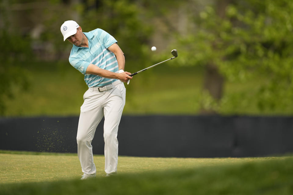 Jordan Spieth chips to the green on the 14th hole during a practice around for the PGA Championship golf tournament at Oak Hill Country Club on Tuesday, May 16, 2023, in Rochester, N.Y. (AP Photo/Abbie Parr)