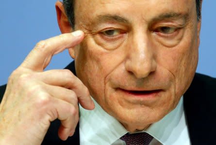 FILE PHOTO - European Central Bank (ECB) President Mario Draghi holds a news conference at the ECB headquarters in Frankfurt, Germany, March 7, 2018. REUTERS/Ralph Orlowski/File Photo