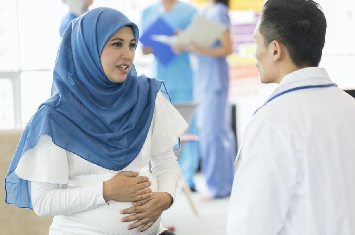 <span class="caption">Islamic ethics allow for many views on abortion, depending on what kind of scriptural sources are considered and by whom.</span> <span class="attribution"><a class="link " href="https://www.gettyimages.com/detail/photo/pregnant-woman-talks-seriously-with-ob-gyn-royalty-free-image/1023744316?adppopup=true" rel="nofollow noopener" target="_blank" data-ylk="slk:SDI Productions/E+ via Getty Images;elm:context_link;itc:0;sec:content-canvas">SDI Productions/E+ via Getty Images</a></span>