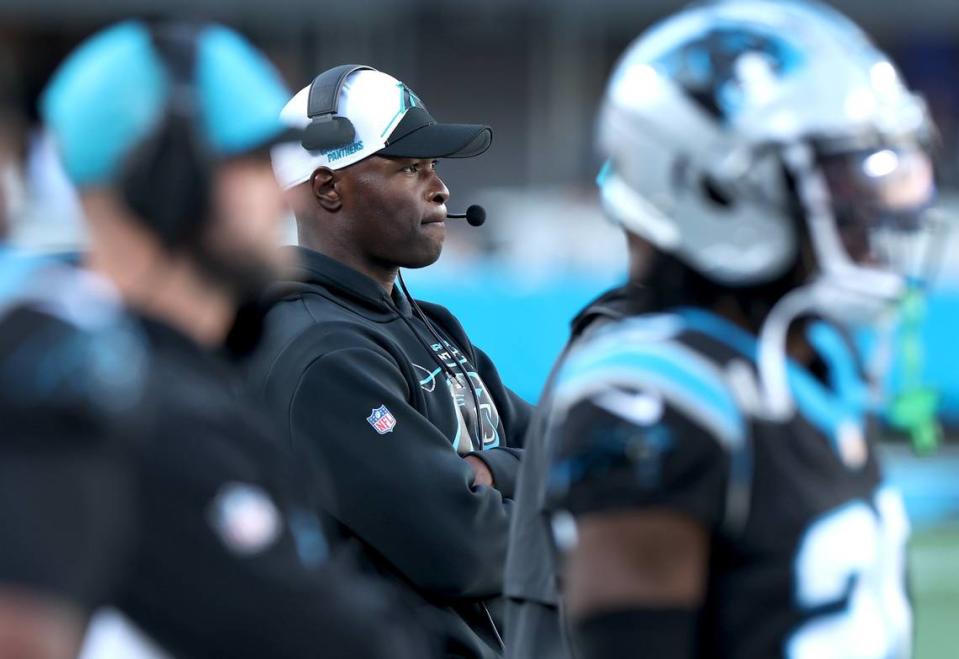 Carolina Panthers Ejiro Evero, center, watches the team battle the Dallas Cowboys during second half action at Bank of America Stadium in Charlotte, NC on Sunday, November 19, 2023. The Cowboys defeated the Panthers 33-10.