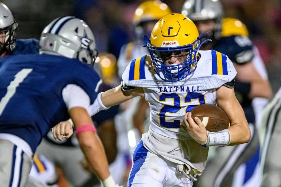 Tattnall Trojan Rhett Dobson heads for a first down against Stratford Friday night.