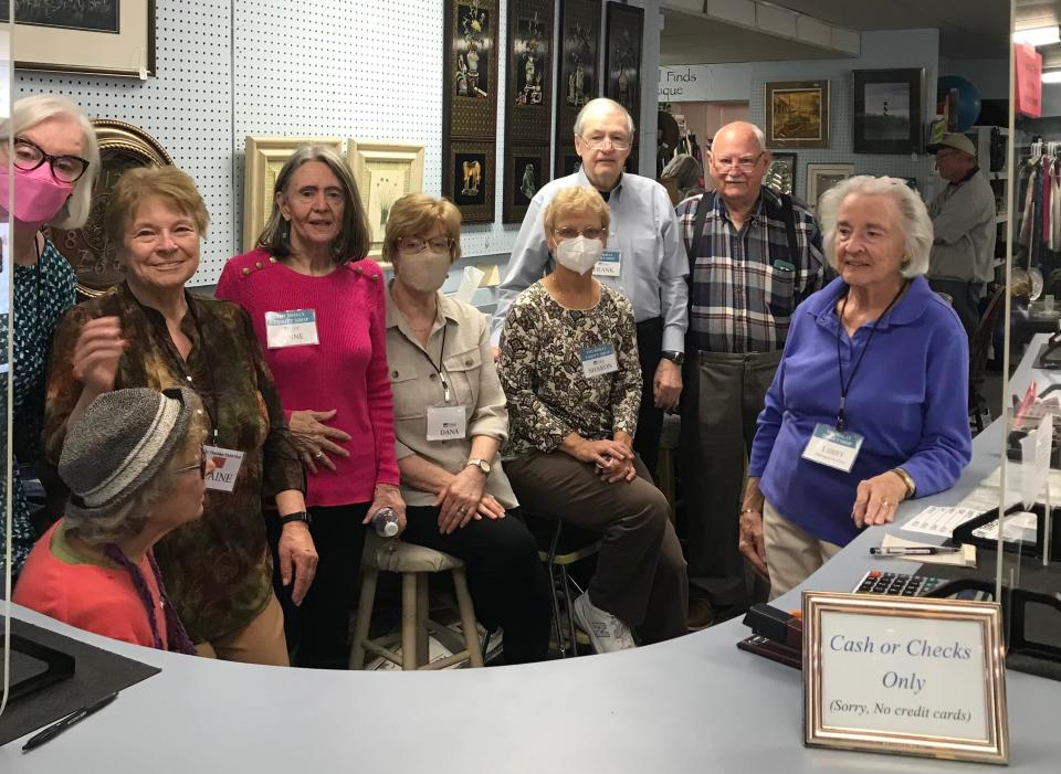 Volunteers pose at the sales counter of the Thursday Thrift Shop at St. James Episcopal Church. The store ministry that has a 55-year history brought in a record $100,000 in sales in 2023 to benefit programs and organizations in Henderson County and beyond.