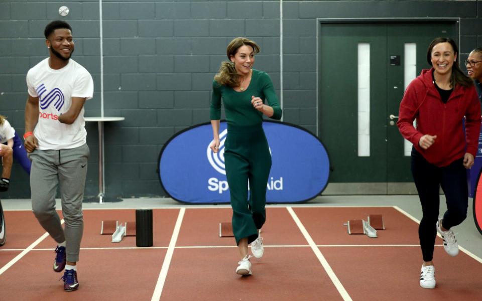 The Duchess of Cambridge (centre) with heptathlete Jessica Ennis-Hill (right) during a SportsAid event at the London Stadium in Stratford -  Yui Mok/PA