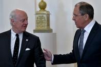 Russian Foreign Minister Sergei Lavrov (right) meets with United Nations envoy for Syria Staffan de Mistura in Moscow, on May 3, 2016