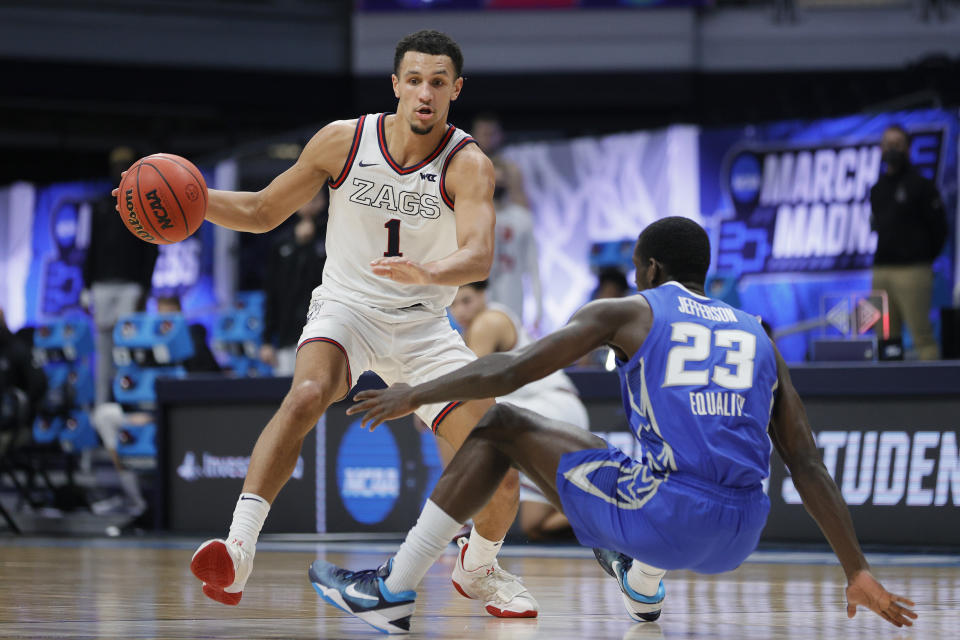 Gonzaga's Jalen Suggs dribbles past Creighton's Damien Jefferson during a Sweet 16 game on March 28. (Sarah Stier/Getty Images)