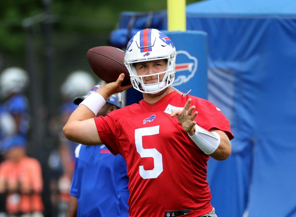 Bills backup quarterback Matt Barkley rolls to his left as he throws against his body during training camp.