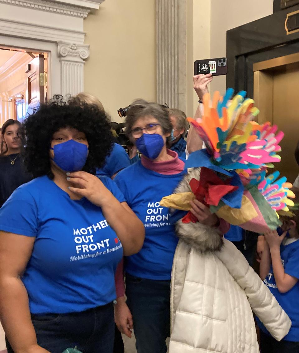 Worcester climate activist Latasha Hughes, left, was one of more than 100 activists: mothers, Gov. Maura Healey to congratulate her on nominating a climate chief, the first ever in the nation, and to voice their support for future endeavors.