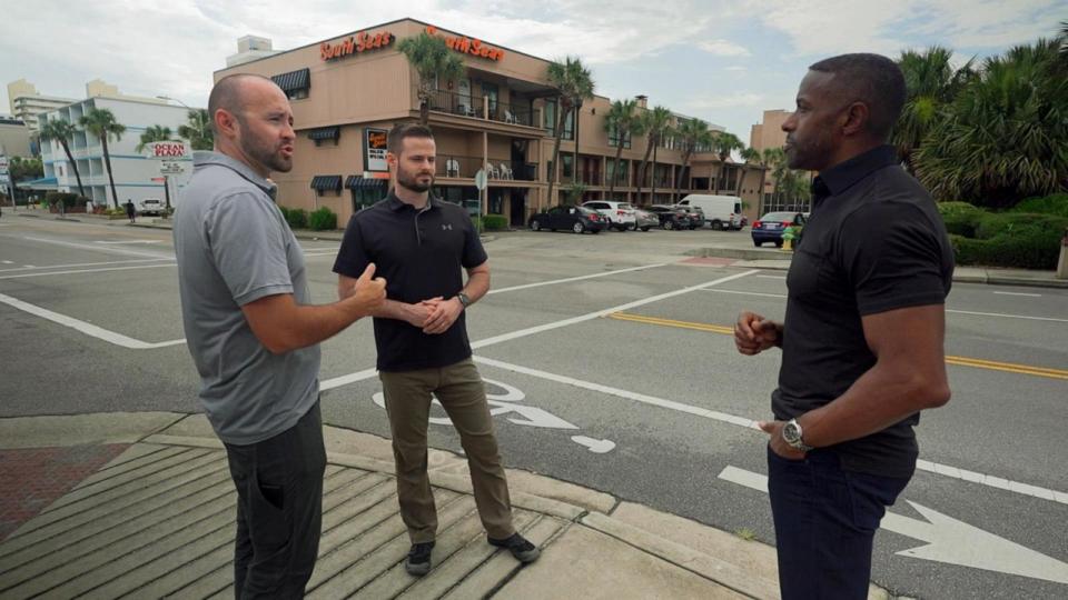 PHOTO: Ryan Smith is seen in Myrtle Beach, South Carolina, interviewing FBI Intelligence Analyst Caleb Messer and FBI Special agent James Cavanagh, who helped solve the Brittanee Drexel case. (ABC News)