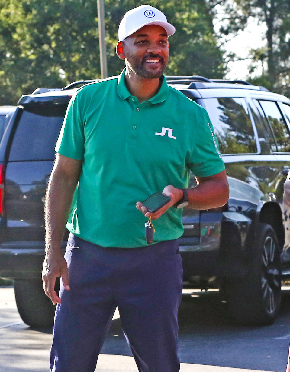 <p>A smiling Will Smith visits a golf course in Los Angeles on Thursday.</p>