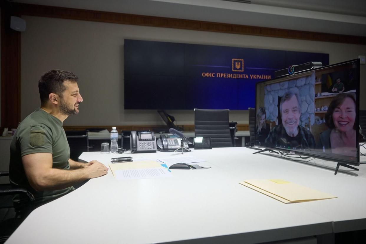 Volodymyr Zelenskyy, left, speaking with Mark Hamill in Zoom meeting.