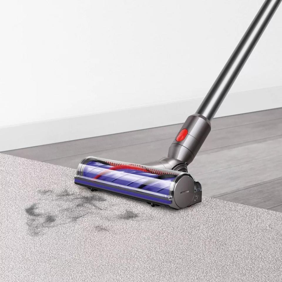 The Dyson vacuuming pet hair off a carpet