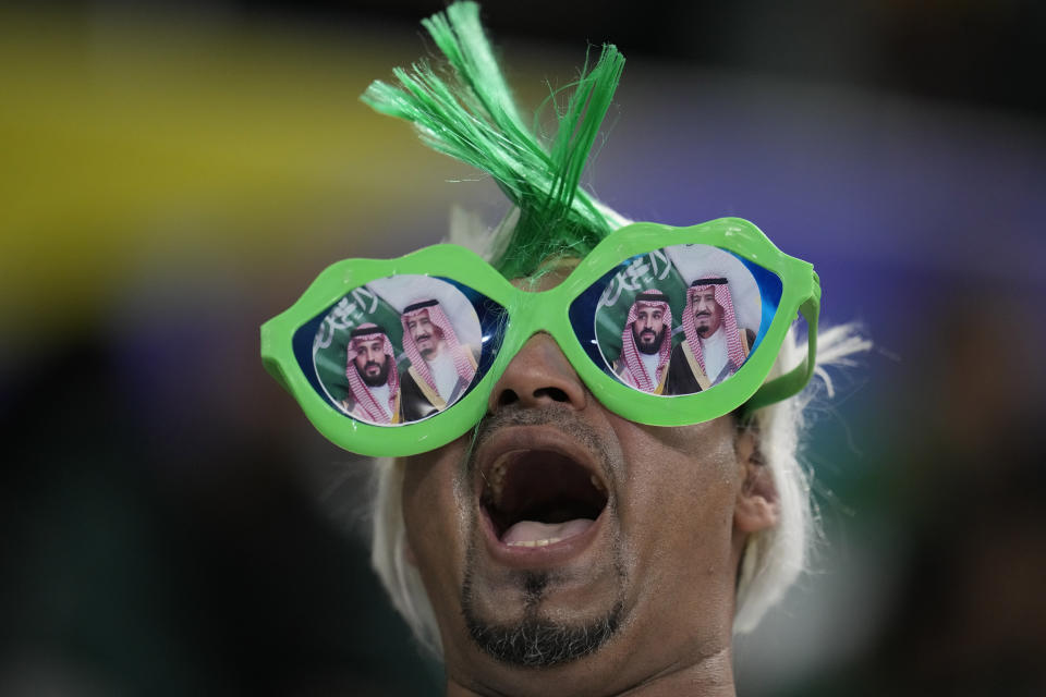 A supporter of Saudi Arabia shouts for his team ahead of the Asian Cup Group F soccer match between Saudi Arabia and Oman at Khalifa International Stadium in Doha, Qatar, Tuesday, Jan. 16, 2024. (AP Photo/Aijaz Rahi)