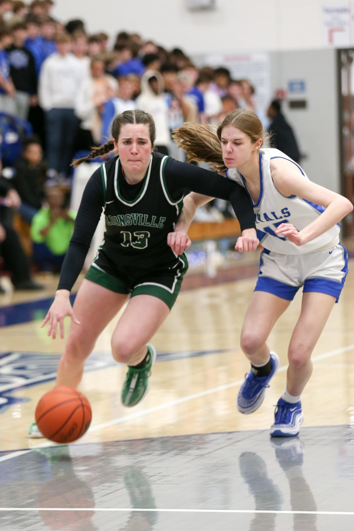 Zionsville Emma Haan (13) makes a drive to the basket as Zionsville takes on Hamilton Southeastern High School in the S8 IHSAA Class 4A Girls Basketball State Semi-finals; Feb 2, 2024; Fishers, IN, USA; at Hamilton Southeastern High School.