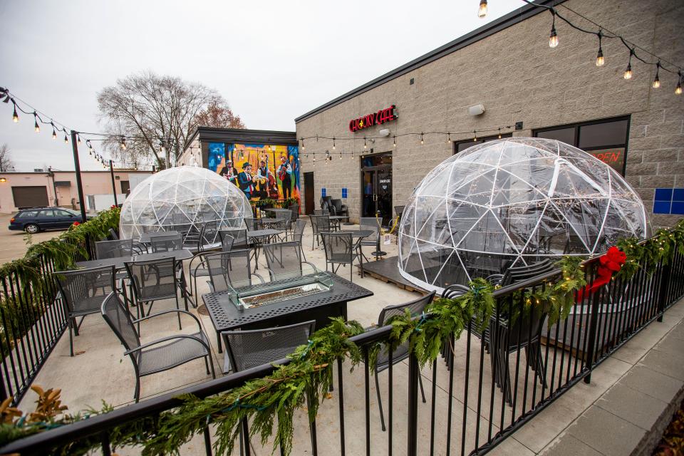 An outdoor dining area with igloo style enclosures Wednesday, Dec. 1, 2021 at Chicory Cafe and Table in Mishawaka. 