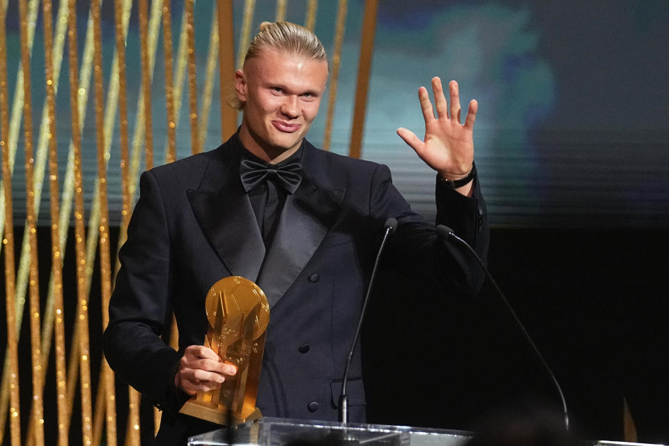 Manchester City's Erling Haaland celebrates after receiving the Gerd Müller trophy during the 67th Ballon d'Or (Golden Ball) award ceremony at Theatre du Chatelet in Paris, France, Monday, Oct. 30, 2023. (AP Photo/Michel Euler)
