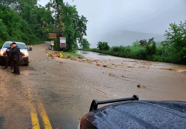 <p>New York State Police/AFP via Getty </p> This handout image courtesy of the New York State Police shows heavy flooding and washout on State Route 9W of the Palisades Interstate Parkway in Rockland County, New York, on July 9, 2023.