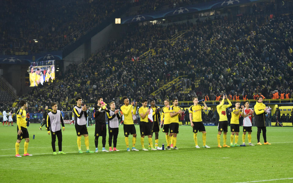 Dortmund players acknowledge the supporters after losing 2-3 during the Champions League quarterfinal first leg soccer match between Borussia Dortmund and AS Monaco in Dortmund, Germany, Wednesday, April 12, 2017. (AP Photo/Martin Meissner)