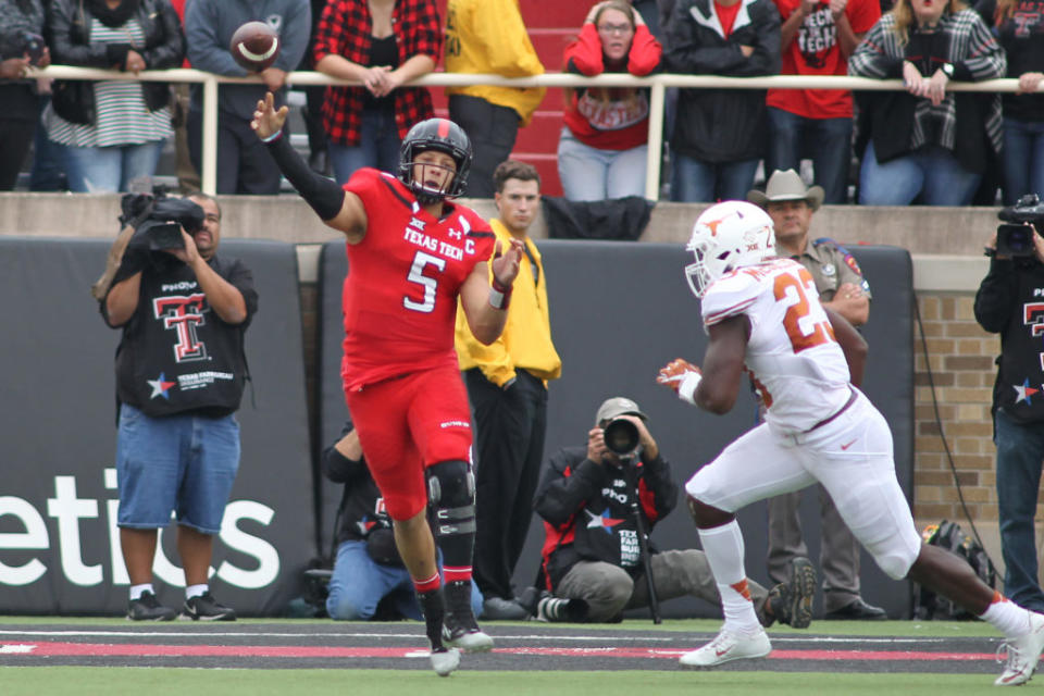 Nov 5, 2016; Lubbock, TX, USA; Texas Tech Red Raiders quarterback Patrick Mahomes (5) throws a pass against the University of Texas Longhorns in the second half at Jones AT&T Stadium. UT defeated Texas Tech 45-37. Mandatory Credit: Michael C. Johnson-USA TODAY Sports