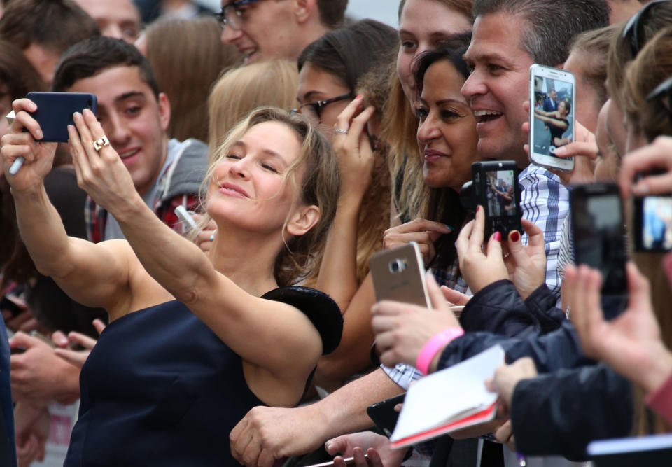 Renee Zellweger poses for photographs in London