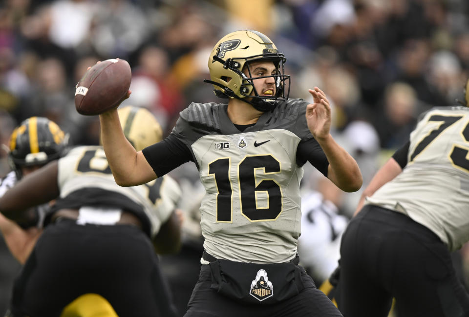 Purdue quarterback Aidan O'Connell (16) throws a pass during the second half of an NCAA college football game against Iowa, Saturday, Nov. 5, 2022, in West Lafayette, Ind. (AP Photo/Marc Lebryk)