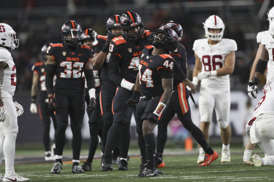 Oregon State linebacker Melvin Jordan IV (44) and defensive lineman Takari Hickle (43) react during the second half of an NCAA college football game against Stanford Saturday, Nov. 11, 2023, in Corvallis, Ore. Oregon State won 62-17. (AP Photo/Amanda Loman)