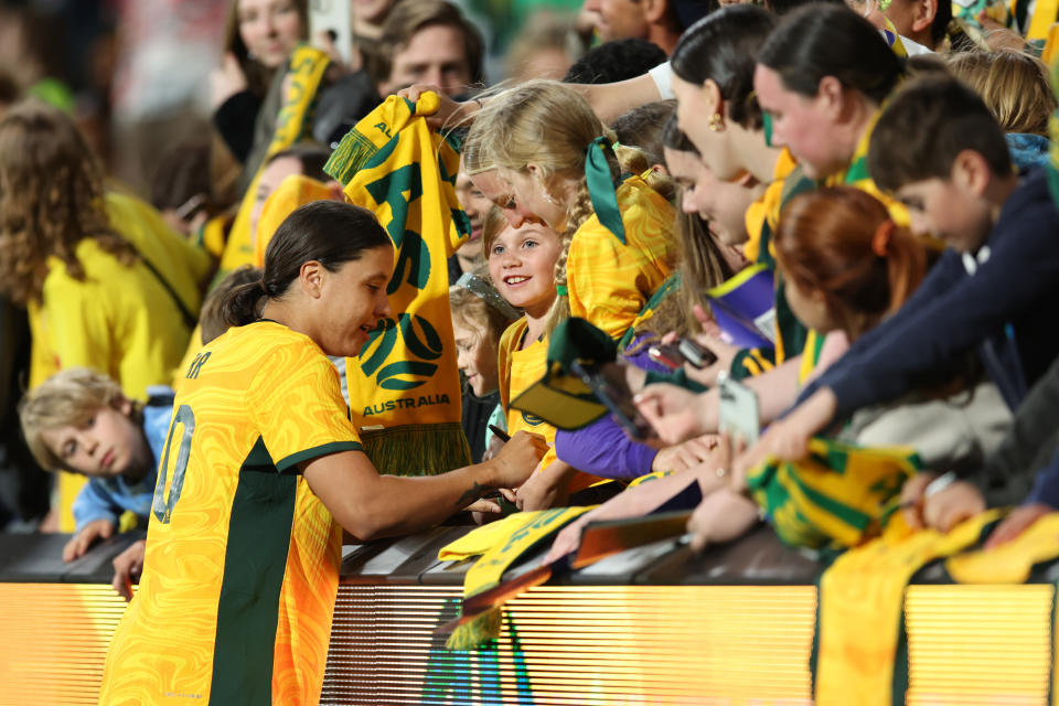 PERTH, AUSTRALIA - OCTOBER 26:  Samantha Kerr of the Matildas signs autographs after the AFC Women's Asian Olympic Qualifier match between Australia Matildas and IR Iran at HBF Park on October 26, 2023 in Perth, Australia. (Photo by Will Russell/Getty Images)