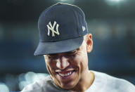 New York Yankees' Aaron Judge smiles as he speaks during an interview after the team's baseball game against the Toronto Blue Jays on Wednesday, Sept. 28, 2022, in Toronto. Judge hit his 61st home run of the season. (Nathan Denette/The Canadian Press via AP)