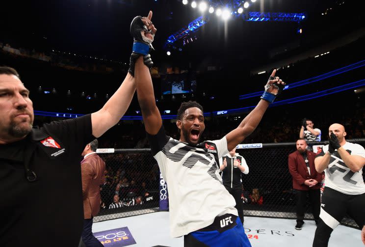 Neil Magny celebrates his unanimous decision victory Friday at UFC 207 over ex-welterweight champ Johny Hendricks. (Getty Images)