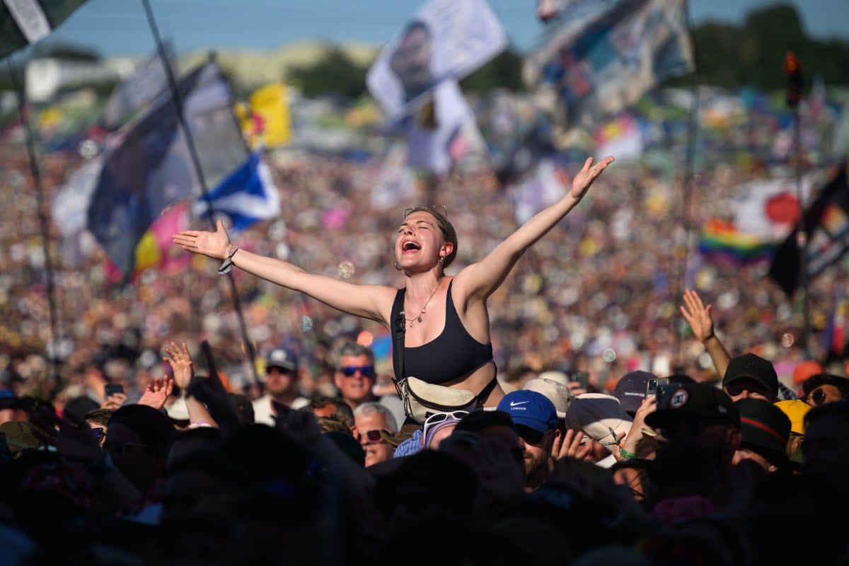 People sing along as Lewis Capaldi performs on the Pyramid Stage on Day 4 of Glastonbury Festival 2023 (Getty Images)