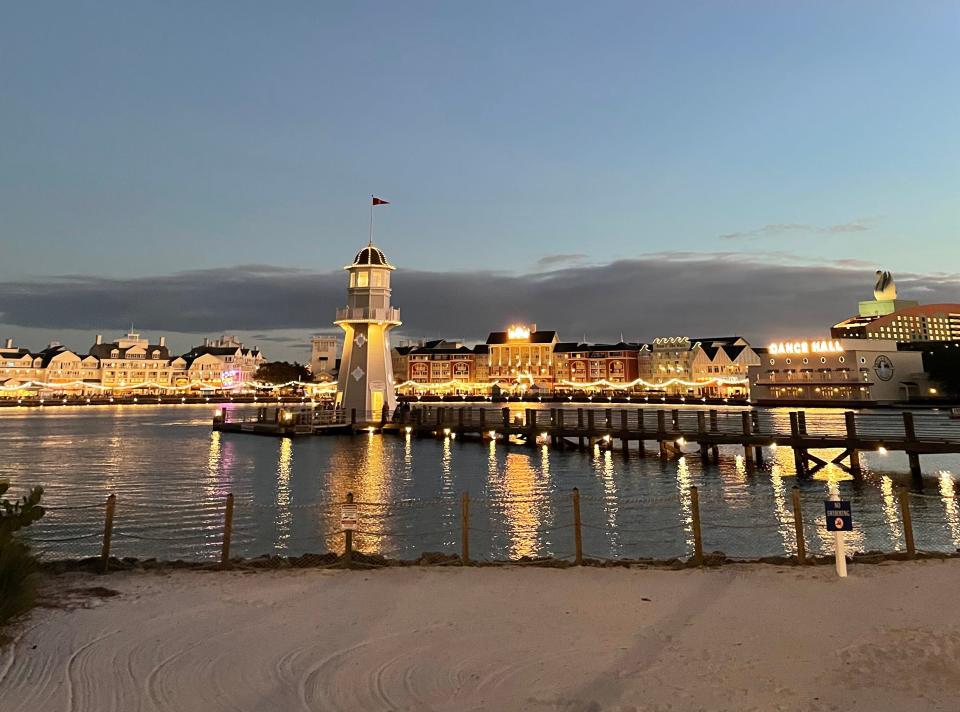 View of Disney boardwalk lit up at night