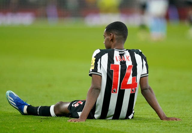 Alexander Isak goes down injured against Aston Villa