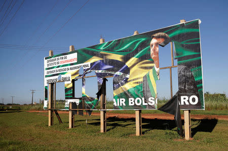 A billboard in support of Federal deputy Jair Bolsonaro, a pre-candidate for Brazil's presidential elections, is seen in Campo Novo do Parecis, Brazil April 27, 2018. Picture taken April 27, 2018. REUTERS/Ueslei Marcelino