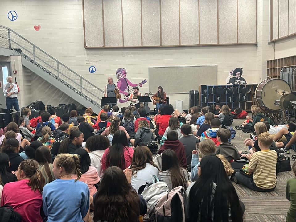 Sarah Pirkle’s group performs Sept. 18, 2023, for students and faculty at Gresham Middle School. The school performances aim at recruiting for the fall session of Junior Appalachian Musicians.