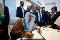 Saudi Oil Minister Khalid al-Falih signs the guest visitors book during the opening of Baghdad International Exhibition, Baghdad, Iraq October 21, 2017. REUTERS/Khalid al-Mousily