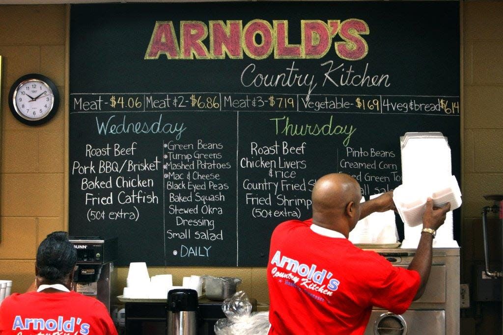 The menu advertises the daily specials at Arnold's Country Kitchen, one of the “meat and three’s” in Nashville.