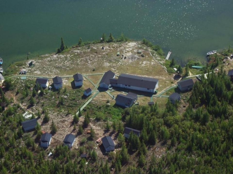 An overhead view of Lac La Martre Adventures, a fishing lodge near Whatì, N.W.T. The lodge was acquired by the Tłı̨chǫ Investment Corporation in March.  (NWTFishing.com - image credit)