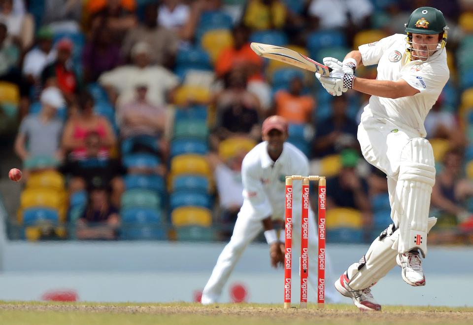 Australian batsman Ed Cowan plays a shot during the final day of the first-of-three Test matches between Australia and West Indies at the Kensington Oval stadium in Bridgetown on April 11, 2012. Australia is chasing a target of 192 runs to win the match. AFP PHOTO/Jewel Samad (Photo credit should read JEWEL SAMAD/AFP/Getty Images)