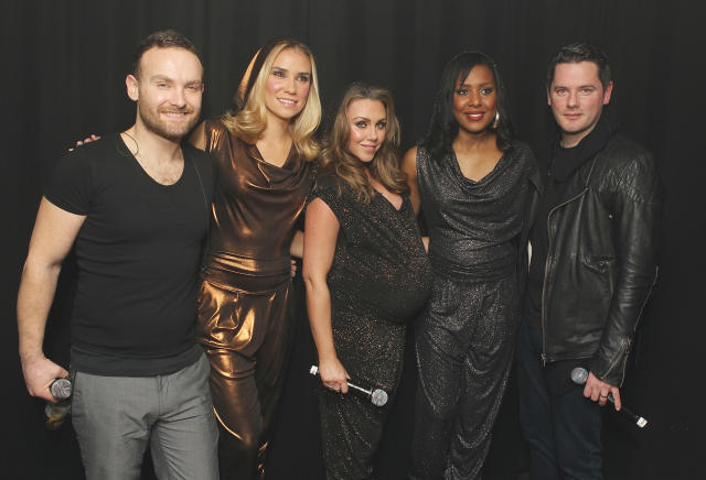 Kevin Simms, Jessica Taylor, Michelle Heaton, Kelli Young and Tony Lundon of Liberty X pose backstage at G-A-Y on February 1, 2014. (Redferns via Getty Images)