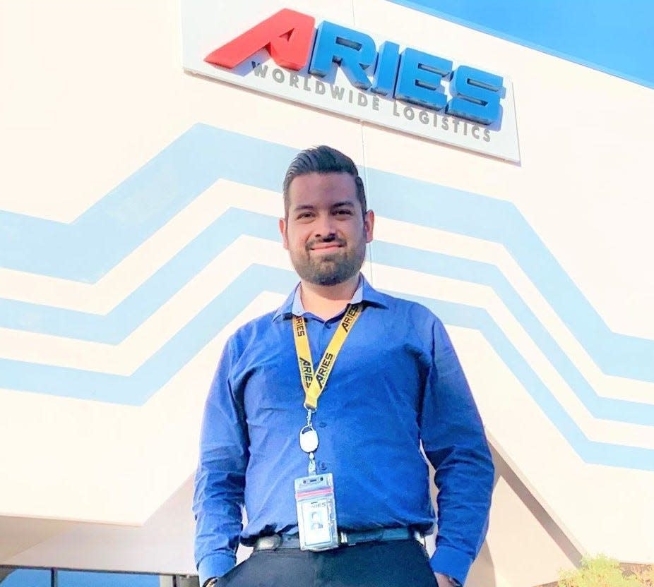 Aries Worldwide Logistics District Director Jose Guzman is pictured in front of one of the company's facilities in this undated photo.