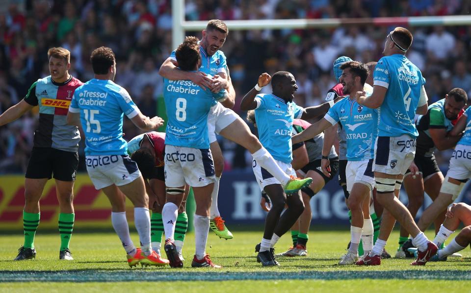 Montpellier players celebrate their victory during the Heineken Champions Cup Round of 16 Leg Two match between Harlequins and Montpellier Herault Rugby at Twickenham Stoop - GETTY IMAGES