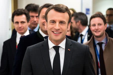 French President Emmanuel Macron prepares to meet German Chancellor Angela Merkel on the sidelines of an EU summit in Brussels, Belgium March 21, 2019. Geert Vanden Wijngaert/Pool via Reuters