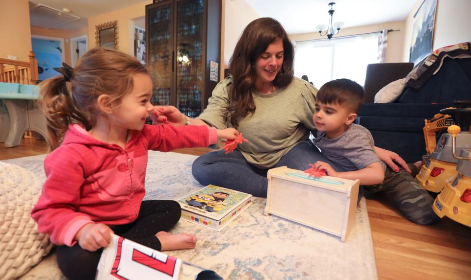 Danielle DeCristoforo plays with her children, Avery, 2 and Lincoln, 4 in their New City, N.Y. home May 5, 2023.