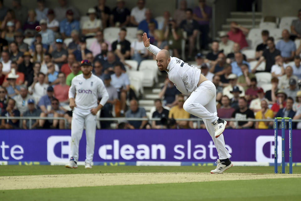 England's Jack Leach bowls a delivery during the second day of the third cricket test match between England and New Zealand at Headingley in Leeds, England, Friday, June 24, 2022. (AP Photo/Rui Vieira)