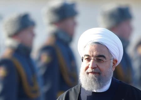 FILE PHOTO: Iranian President Hassan Rouhani inspects the honour guard during a welcoming ceremony upon his arrival at Vnukovo International Airport in Moscow, Russia, March 27, 2017. REUTERS/Maxim Shemetov/File Photo