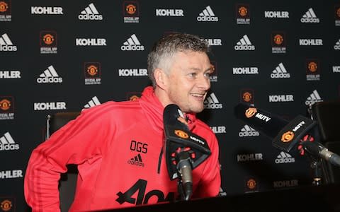 Caretaker Manager Ole Gunnar Solskjaer of Manchester United speaks during a press conference - Credit: Man Utd via Getty Images